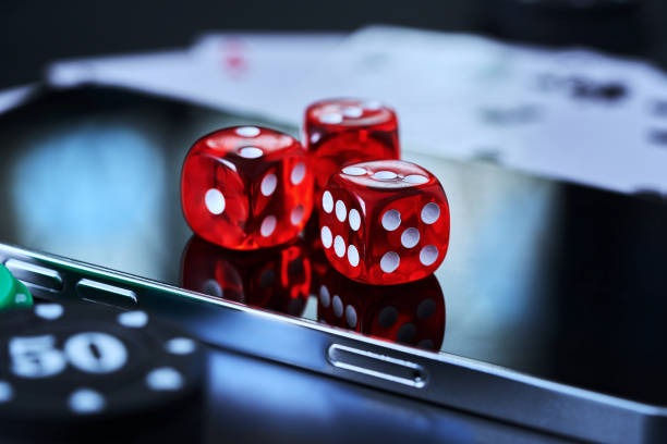 Smartphone displaying Galactic Gems slot game on megawin777 login with mobile-optimized layout, spin button, and balance display